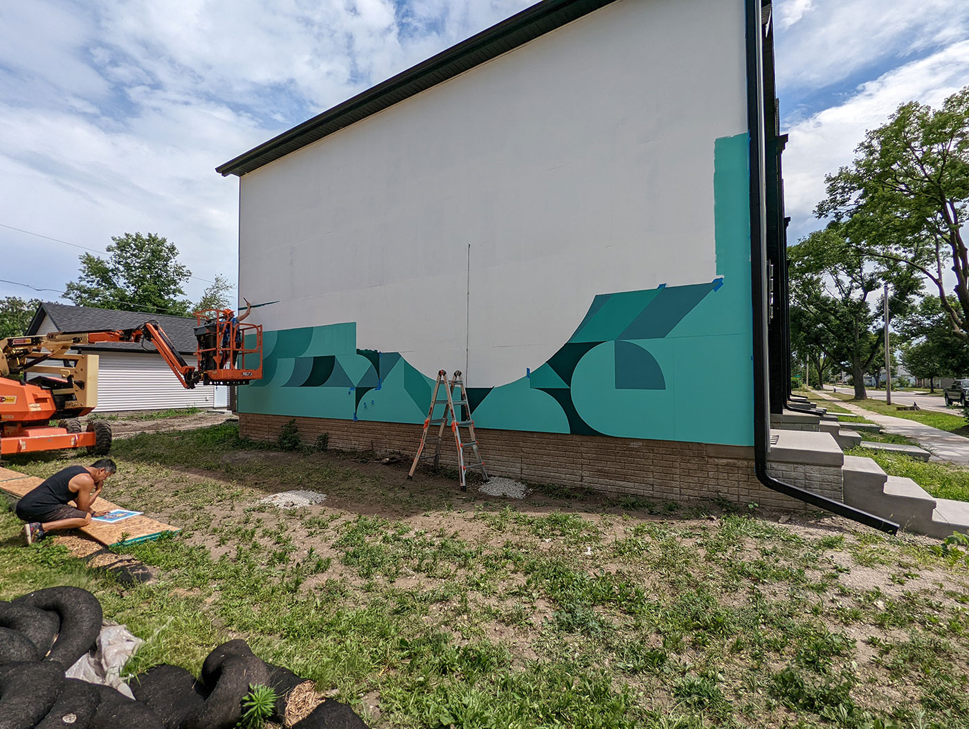 Two Murals Underway in Time Check Neighborhood